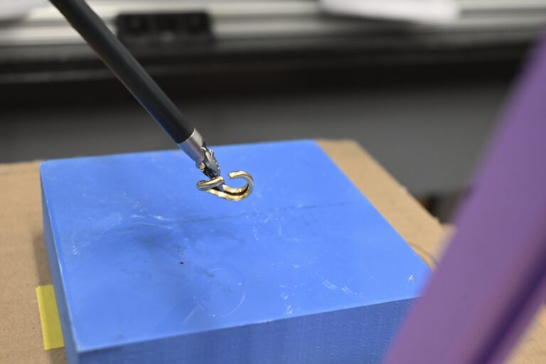 Testing robotic grasping and force feedback.