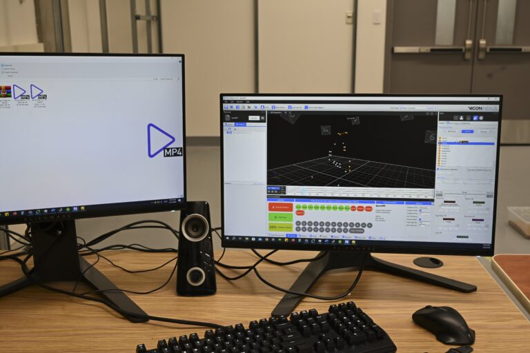 Reviewing motion capture data on the lab's computer system.