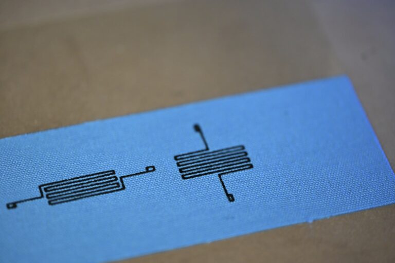 A flexible sensor printed directly onto textile fabric.