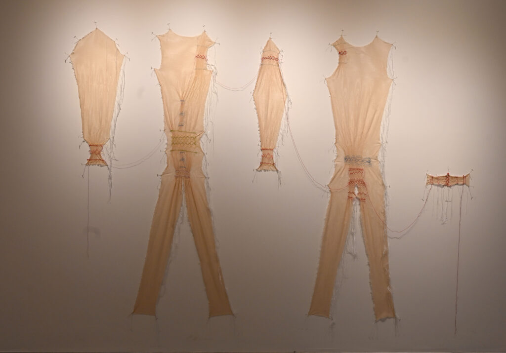 Artist: Samantha McLeish Title: Pinned-Up Date: 2026 Medium: Fabric, thread and Ink
