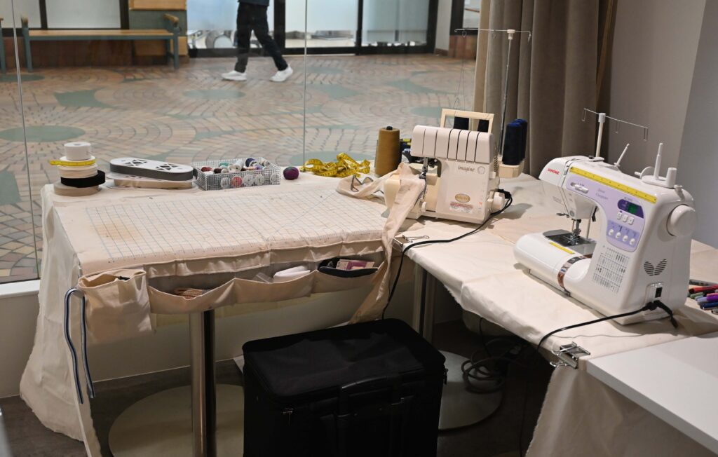 Artist: Sheryl Spencer Title: Tailored to Empower Date: 2026 Medium: Multi-media installation & performance
