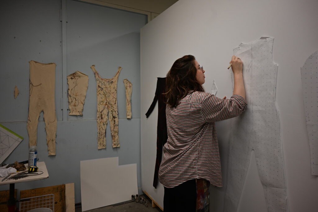 Samantha McLeish working in her studio preparing work for exhibition