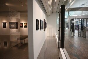 McMullen Gallery - hanging space by the storefront window (emergency exit)